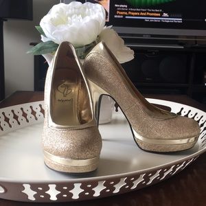 Baby Phat gold platform heels , size 5.5